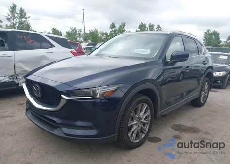 2021 Mazda Cx-5 Grand Touring z USA, uszkodzony, nr VIN JM3KFBDM7M1306409
